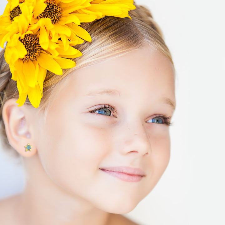 Pendientes oro amarillo niña estrella con briolet azul 